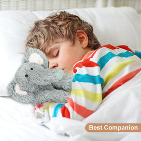 Grey plush elephant ready for bedtime comfort