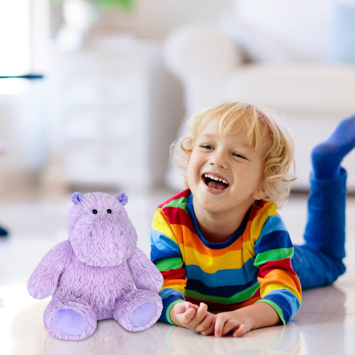 SuzziPals hippo plush cuddled at bedtime for comfort and security