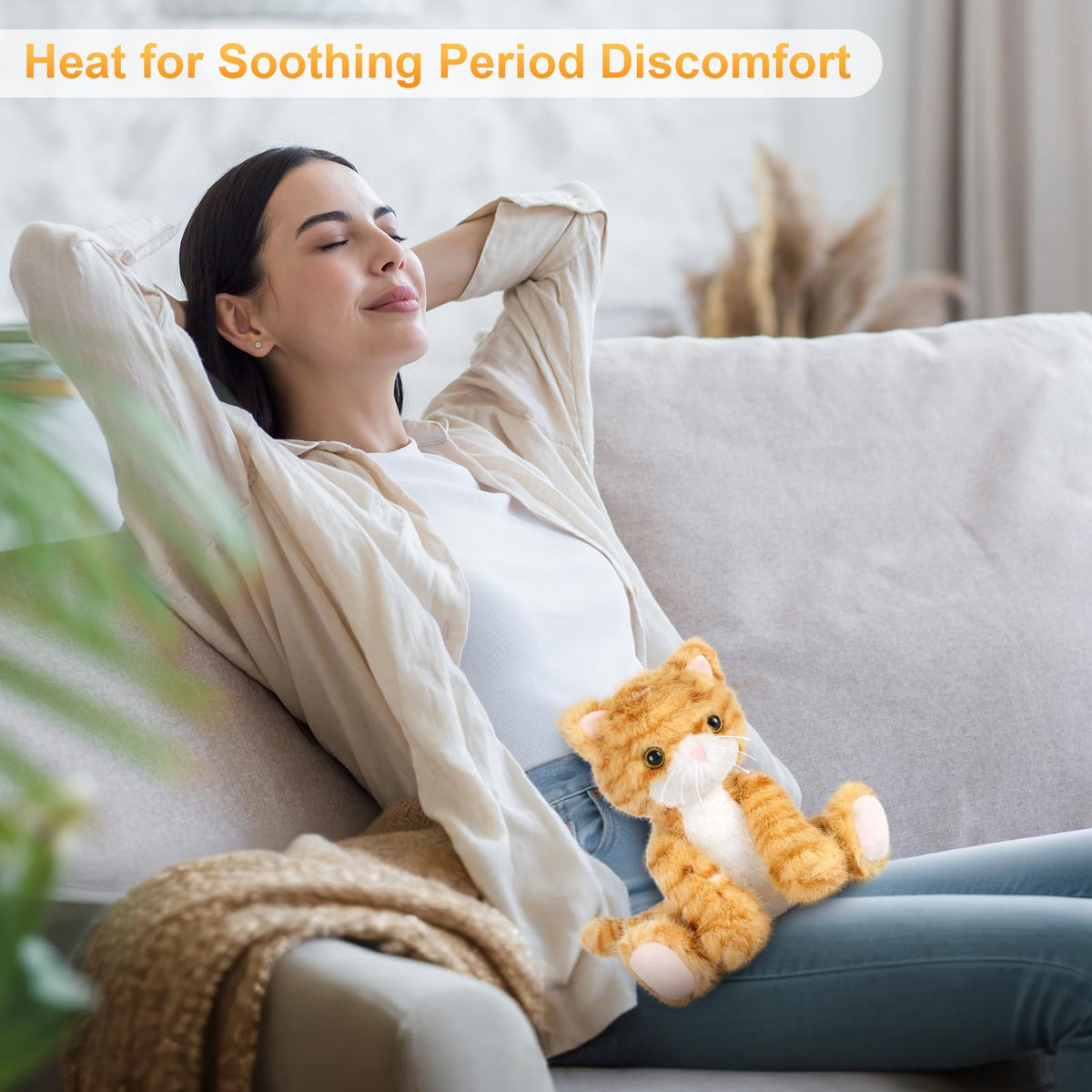 SuzziPals microwave-heat orange cat plush delivers quick gentle warmth.