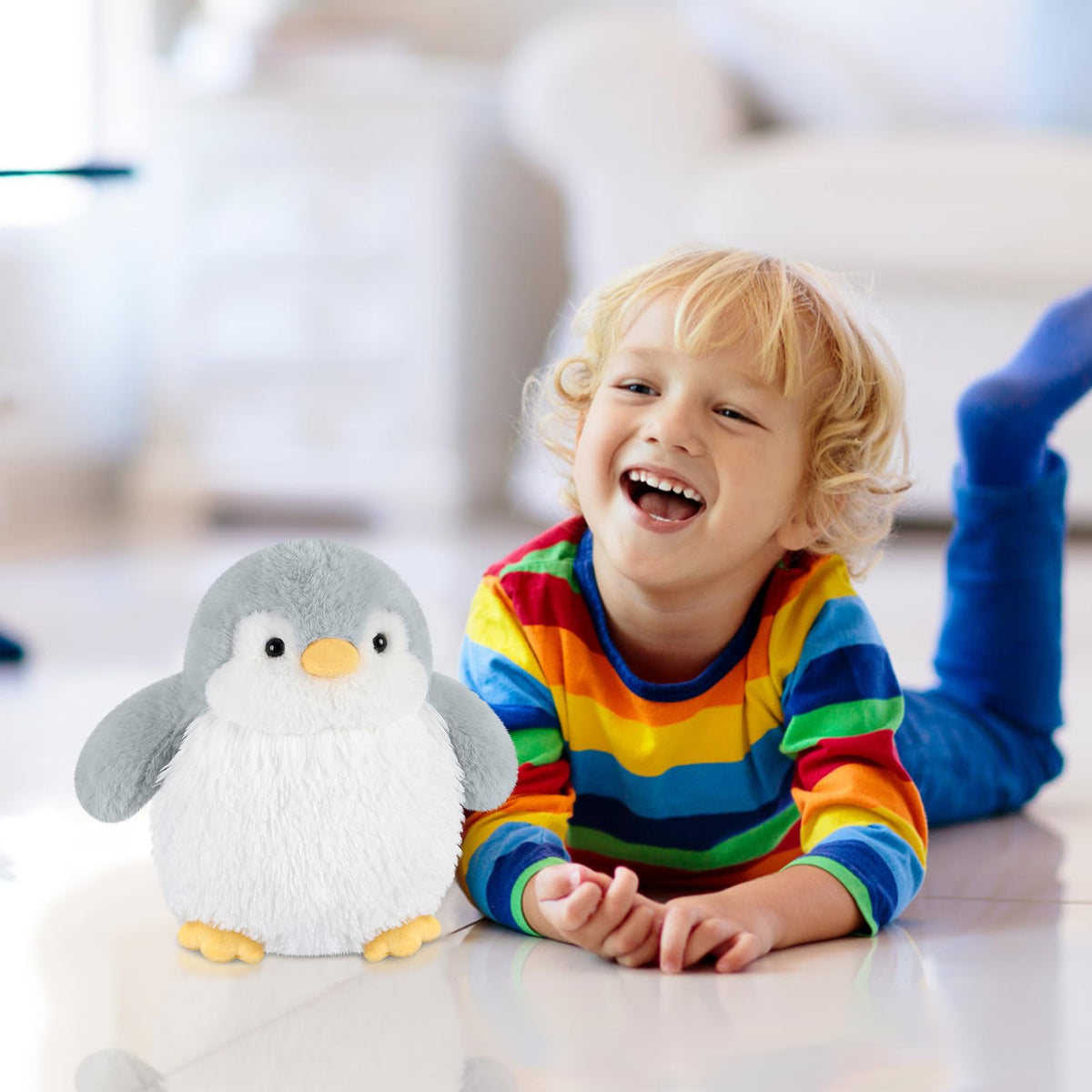 SuzziPals penguin plush encourages unwinding after homework.