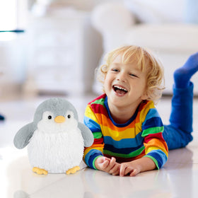 SuzziPals penguin plush encourages unwinding after homework.