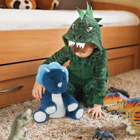 SuzziPals Triceratops decorative dinosaur plush in a kid's room.