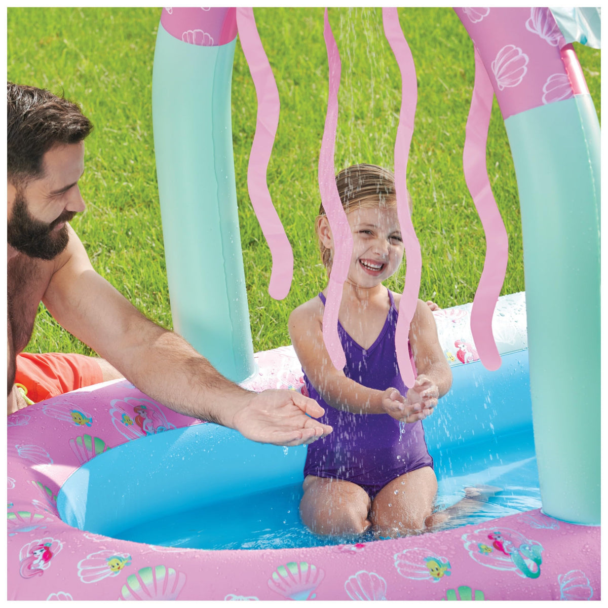 SwimWays Ariel Water Castle includes water shooter and slide for active play