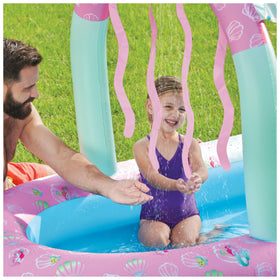 SwimWays Ariel Water Castle includes water shooter and slide for active play