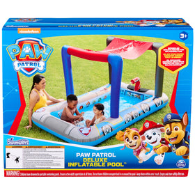 SwimWays Paw Patrol Deluxe Pool in backyard with shade canopy