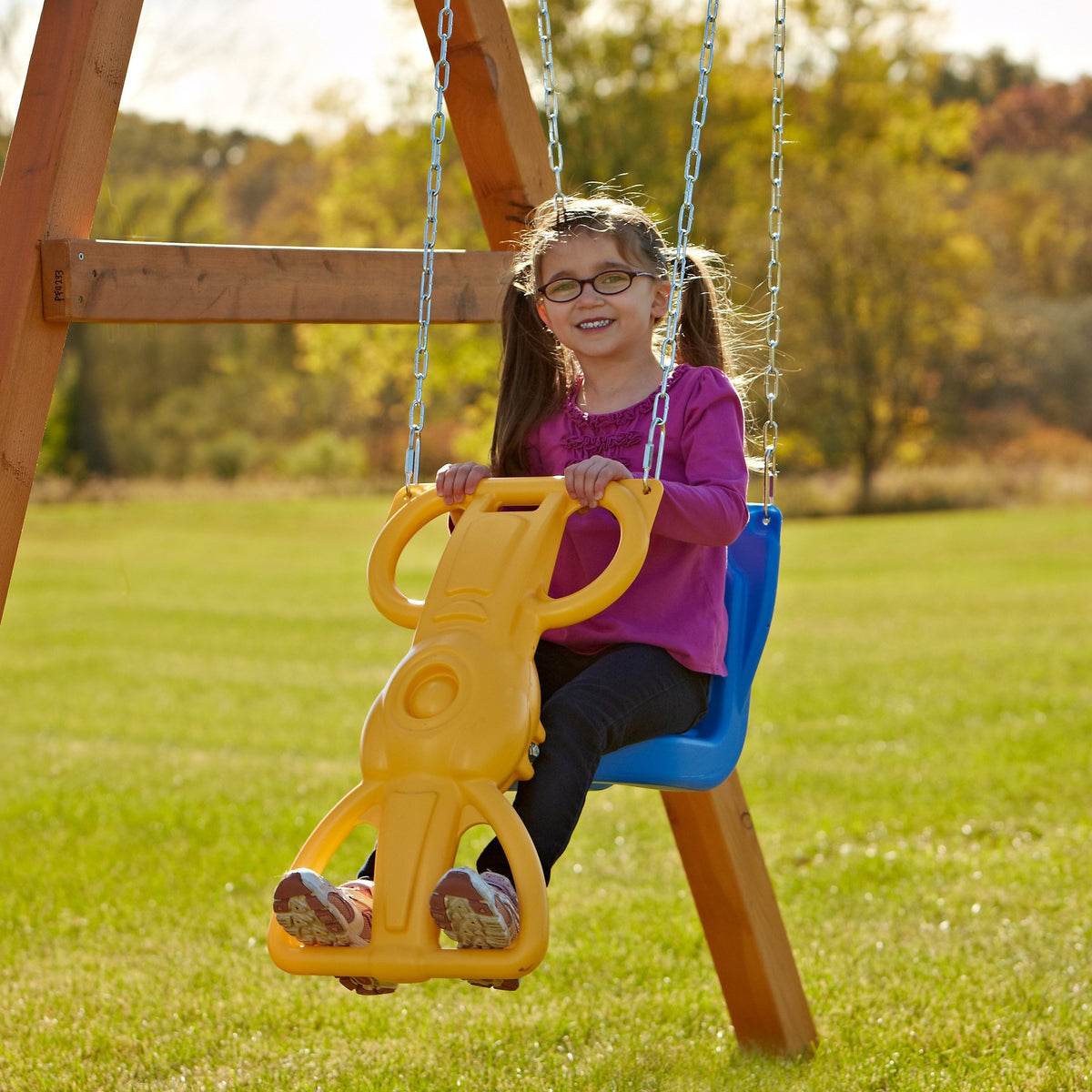 Swing-N-Slide Wind Rider Glider assembly shows quick setup on standard hangers