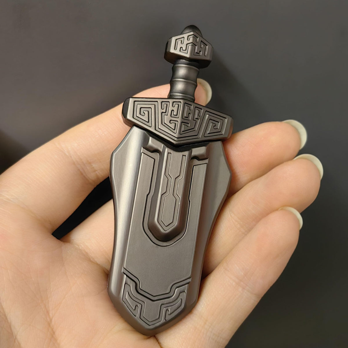 T-Conceal EDC Sword grey front view for compact desk-friendly stress relief.