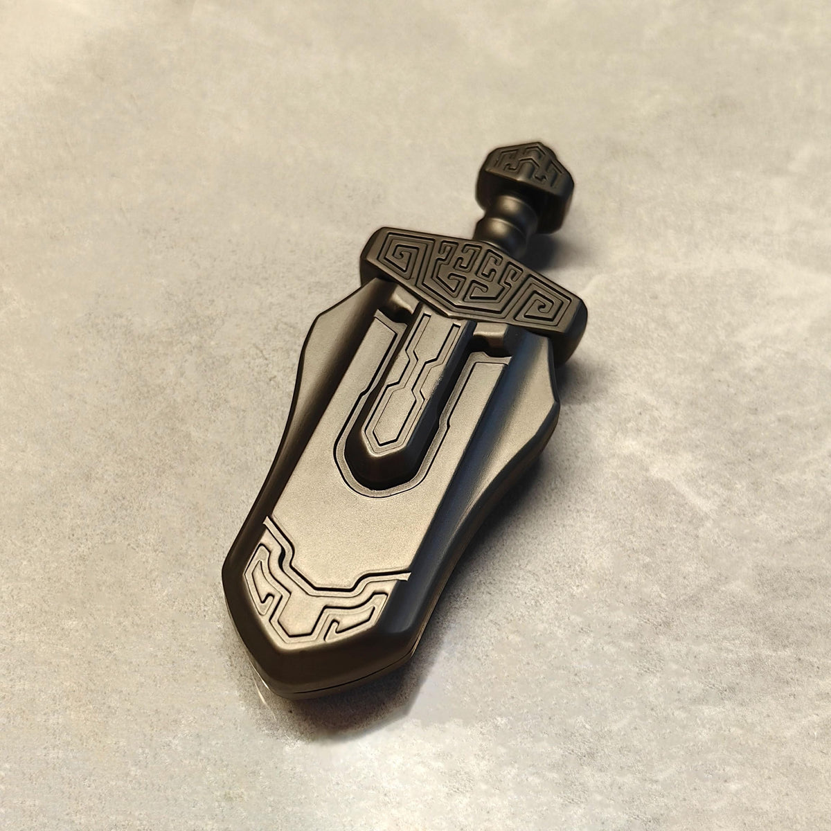 T-Conceal EDC Sword grey side angle highlighting magnetic sliding action for focus.