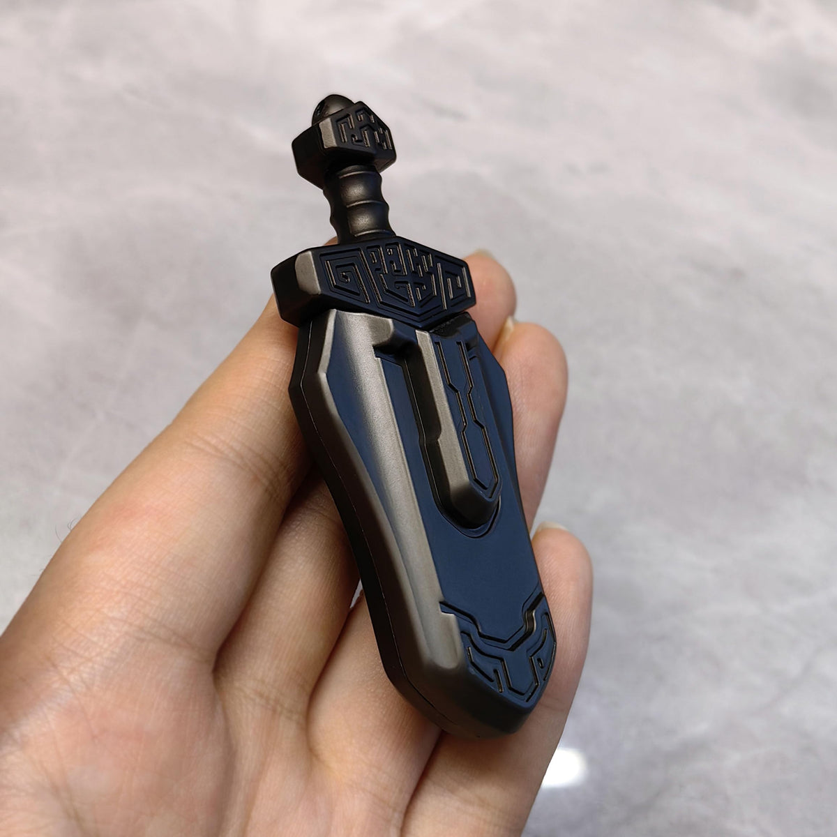 T-Conceal EDC Sword grey top view emphasizes slim ergonomic profile.