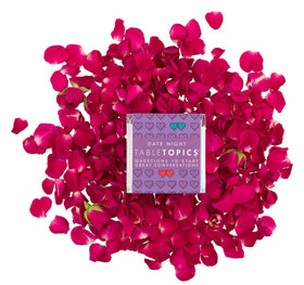 Cozy lamp light with Date Night cards for an intimate evening.