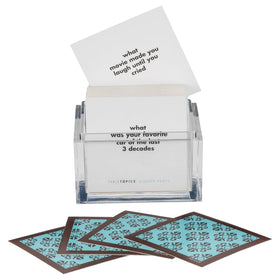 TableTopics host uses cards to guide a relaxed dinner
