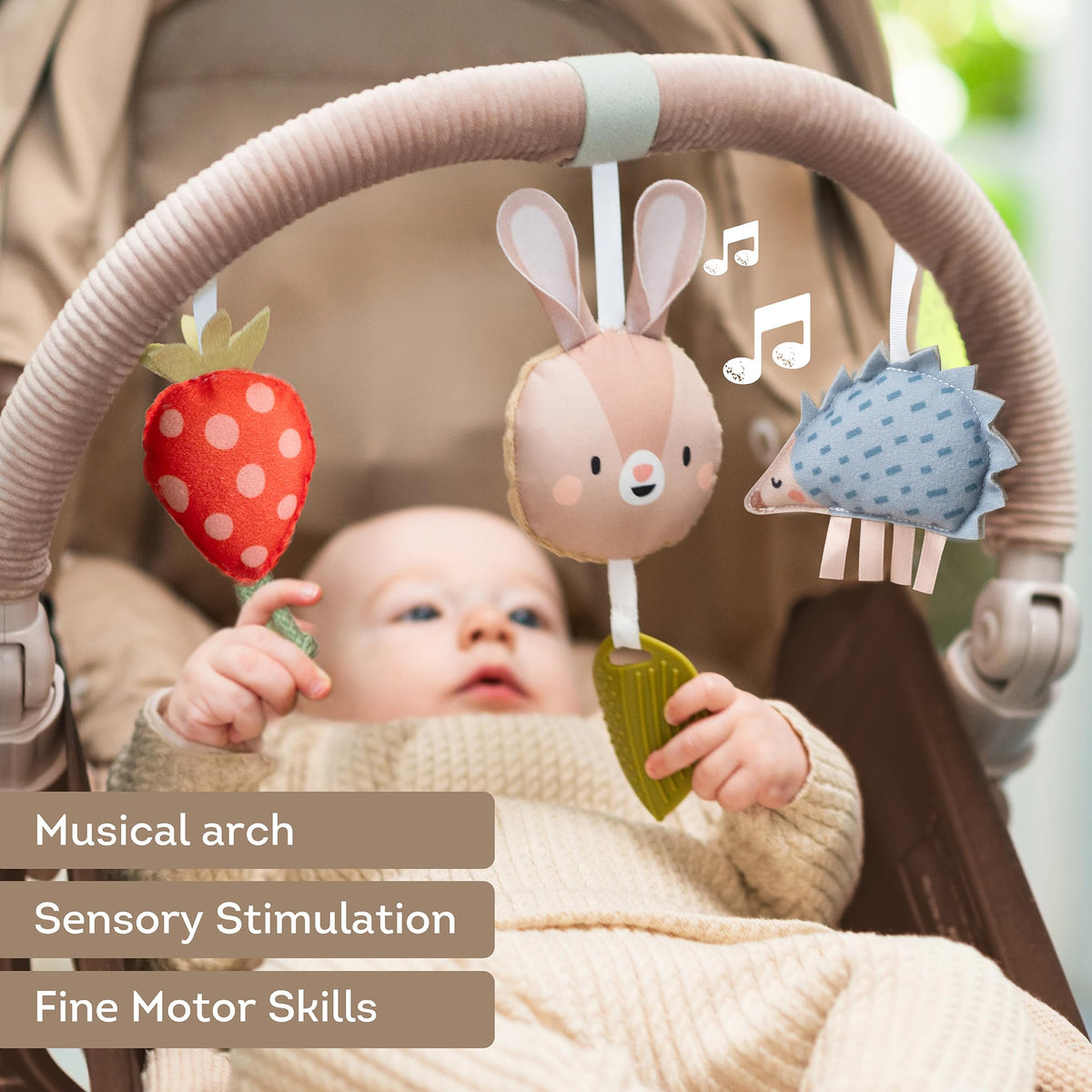 Taf Toys Activity Arch beads and rattle maze encourage fine motor play.