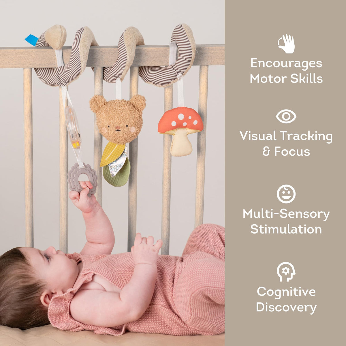 Taf Toys Bear Hug Spiral features colorful teether rings for tactile play.