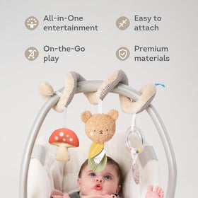 Taf Toys Bear Hug Spiral plush bear with mushroom teether for sensory exploration.