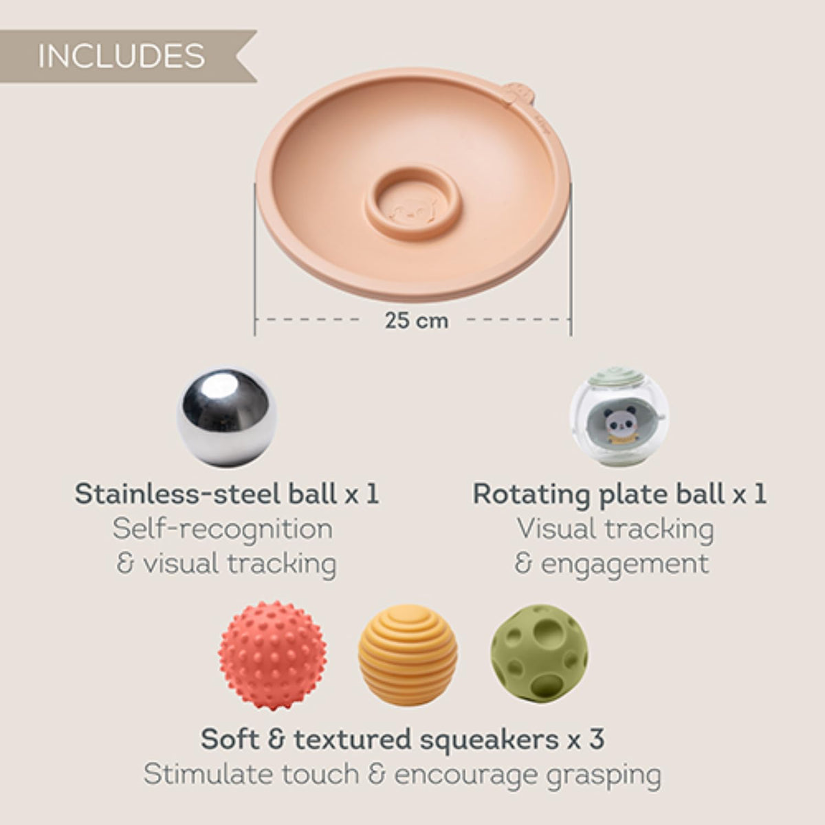 Taf Toys baby grasps a textured ball, highlighting easy grip for tiny hands.