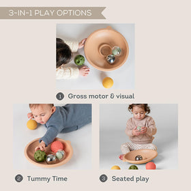 Taf Toys sensory balls textures displayed for tactile exploration during tummy time.