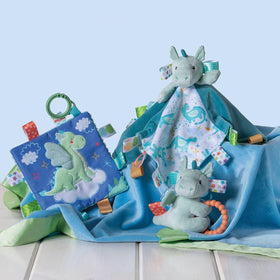 Taggies satin tags on Drax Dragon encourage sensory exploration during play.