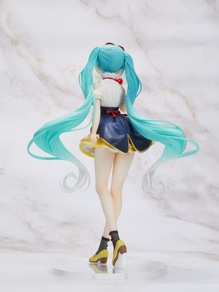Turquoise twin tails capture the character's dynamic styling.