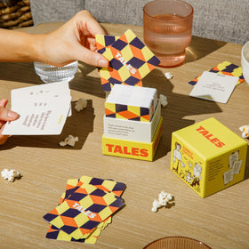 TALES prompt cards at holiday gathering sparking family talk.