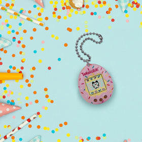 Tamagotchi Original Character game screen reveals interactive guessing gameplay.