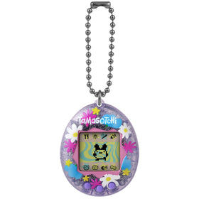 Tamagotchi Original lavender-glitter-shell with flowers, a colorful collectible companion.