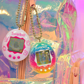 Tamagotchi Original Rainbow egg-to-adult journey visually celebrates progression.