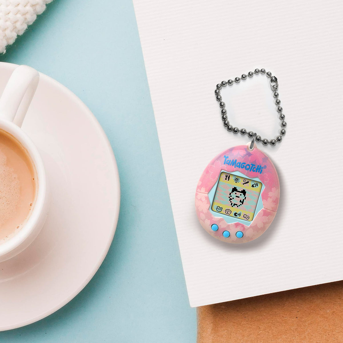 Tamagotchi Original Sakura screen featuring the Numbers game for light, engaging play.
