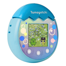 Tamagotchi Pix Ocean Blue cooking meals feature in action.