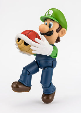 Tamashii Nations Luigi S.H.Figuarts brick block included for interactive display.