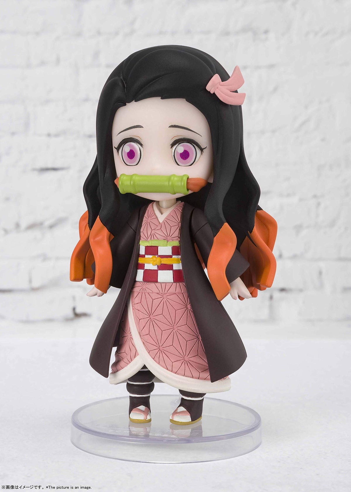 Nezuko figure with optional arms enables dynamic posing options.