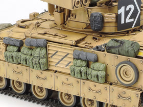 Tamiya Desert Storm M2A2 ODS tracks with textured pads enhance realism.
