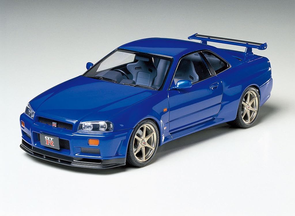 Tamiya Nissan Skyline GT-R V-Spec R34 display-ready kit for showcase shelves.