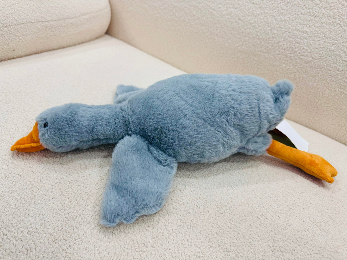 Unpacking Tanha Goose from vacuum pack to reveal fluffy plush