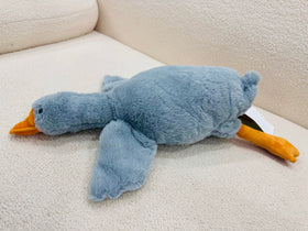 Unpacking Tanha Goose from vacuum pack to reveal fluffy plush