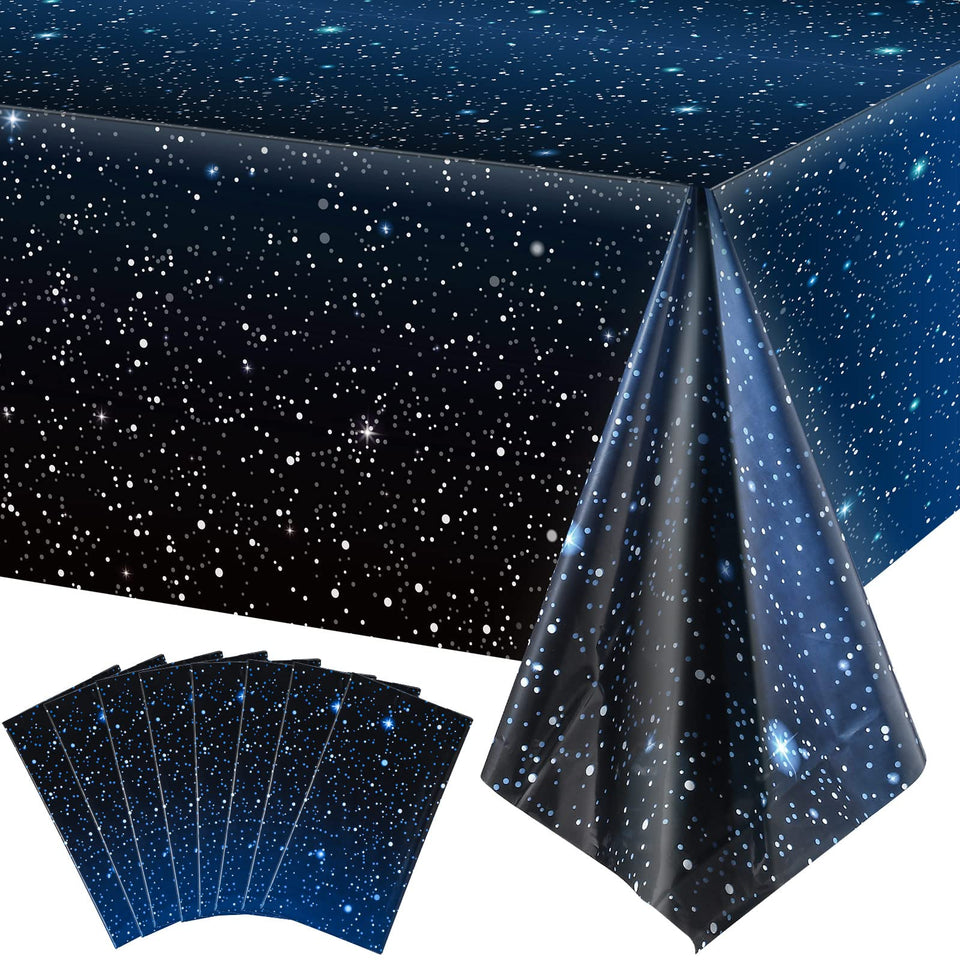 Tatuo starry night space tablecloth over a table, galaxy-themed decor for festive dining.