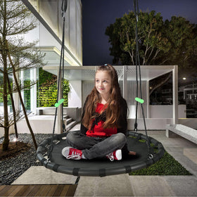 TBMLC saucer swing ideal for backyard gatherings and play