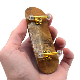 Teak Tuning Pro fingerboard deck Cloud Nine with premium grip and smooth pops.