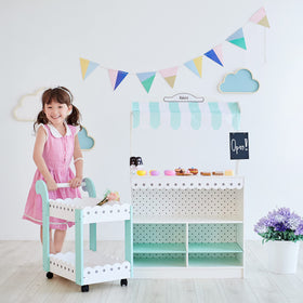 Eighteen pretend desserts include macarons and petit fours for realistic play.