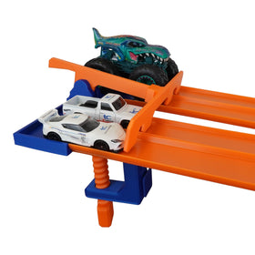 TechConnext monster truck track clamp with 4-lane start gate in blue and orange for action.