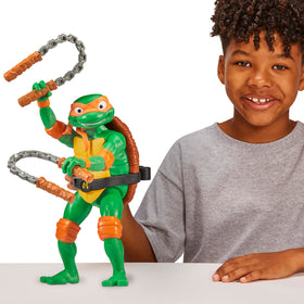Teenage Mutant Ninja Turtles Michelangelo movie packaging—eye-catching display-friendly packaging.