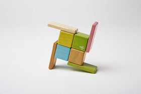Tegu Pocket Pouch 8-Piece Tints open-ended play fosters imagination