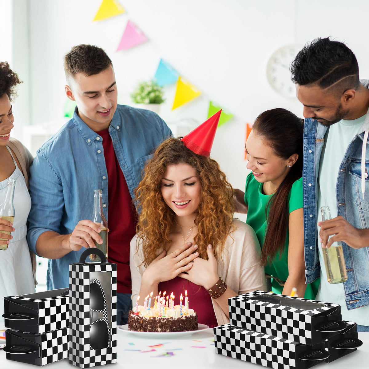 Tellegloww table display setup draws attention to treats and party favors.