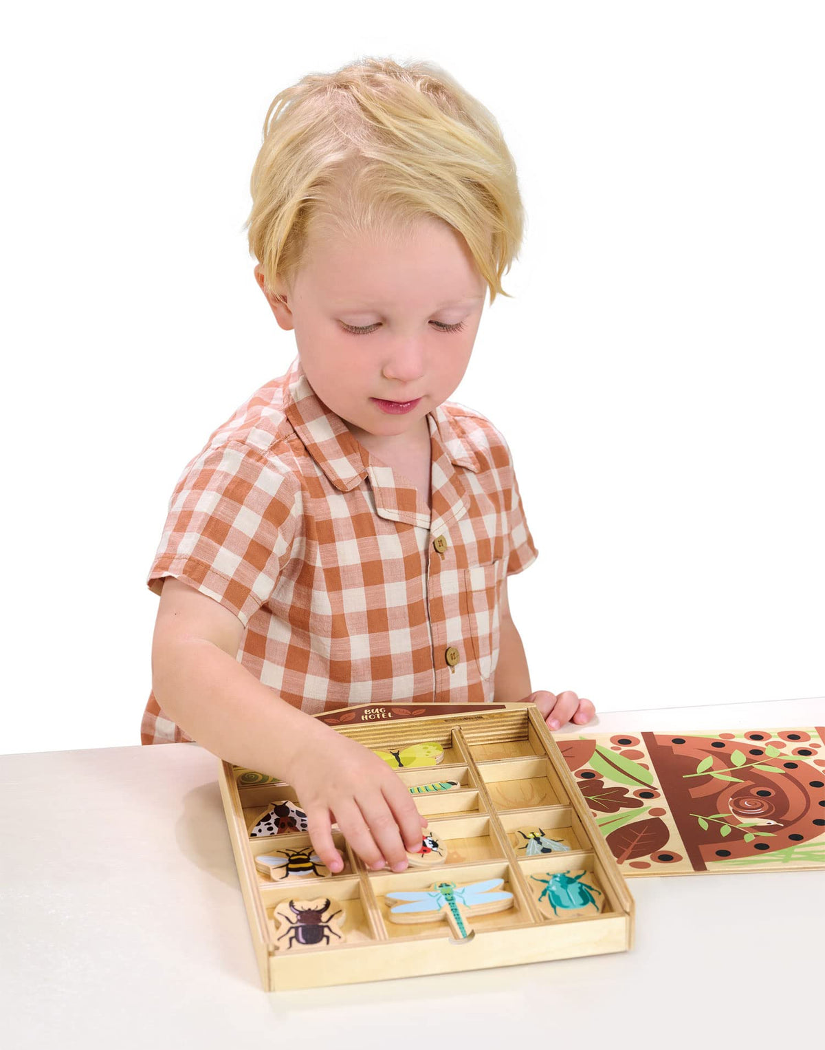 Tender Leaf Toys caterpillar figure provides tactile detail for small hands.