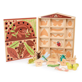 Tender Leaf Toys moth figure introduces texture and insect identification on the shelf.