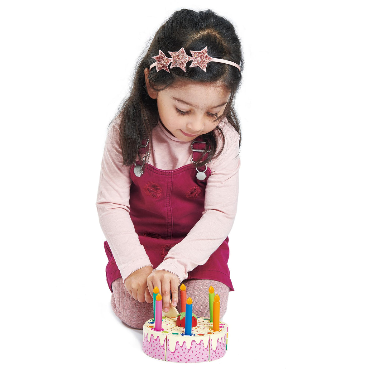 Tender Leaf Toys Rainbow Birthday Cake slices being separated demonstrates interactive slicing