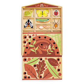 Tender Leaf Toys snail figure adds tactile charm to the Bug Hotel, inviting exploration.