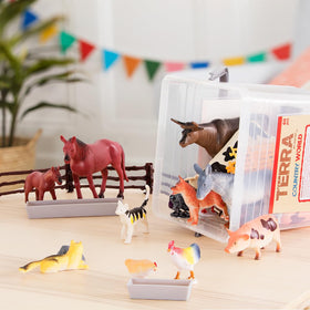 Terra by Battat accessories set enhances pretend play with realistic farm scenes.
