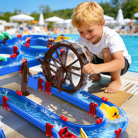 Children enjoy TERRAMUS outdoor water play in sunny backyard.