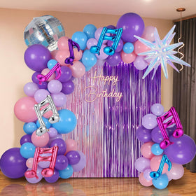 Teyva Daily holographic tassels add a shimmering focal point for a K-Pop party