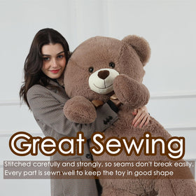 Tezituor teddy bear with satin ribbon adds charming touch to bedrooms